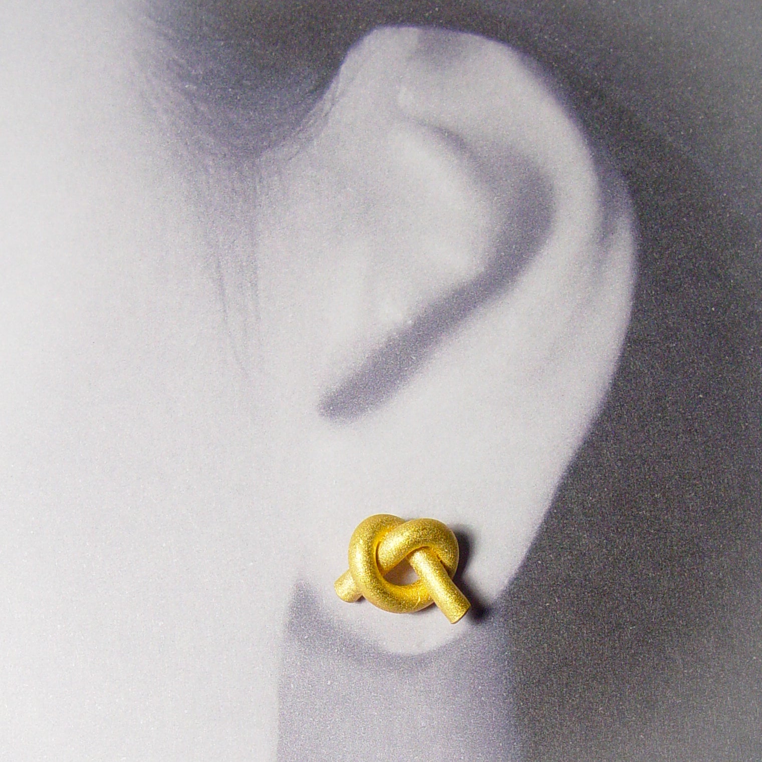 Ohr Knoten rund klein