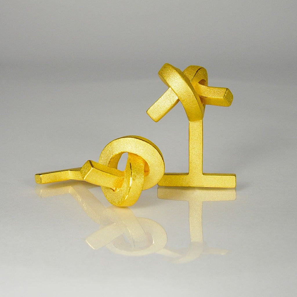 Manschettenknöpfe Knoten