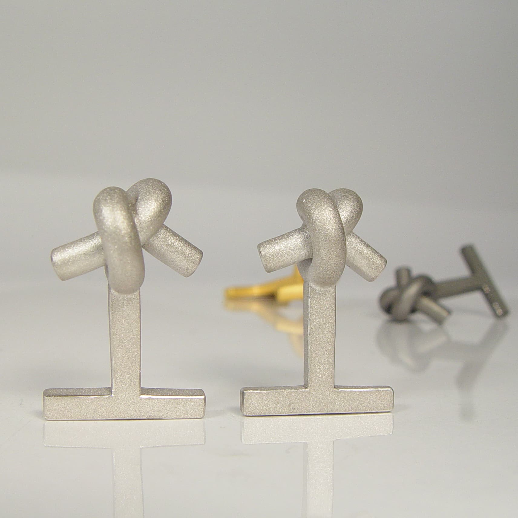 MAN 2 - Manschettenknöpfe Knoten rund