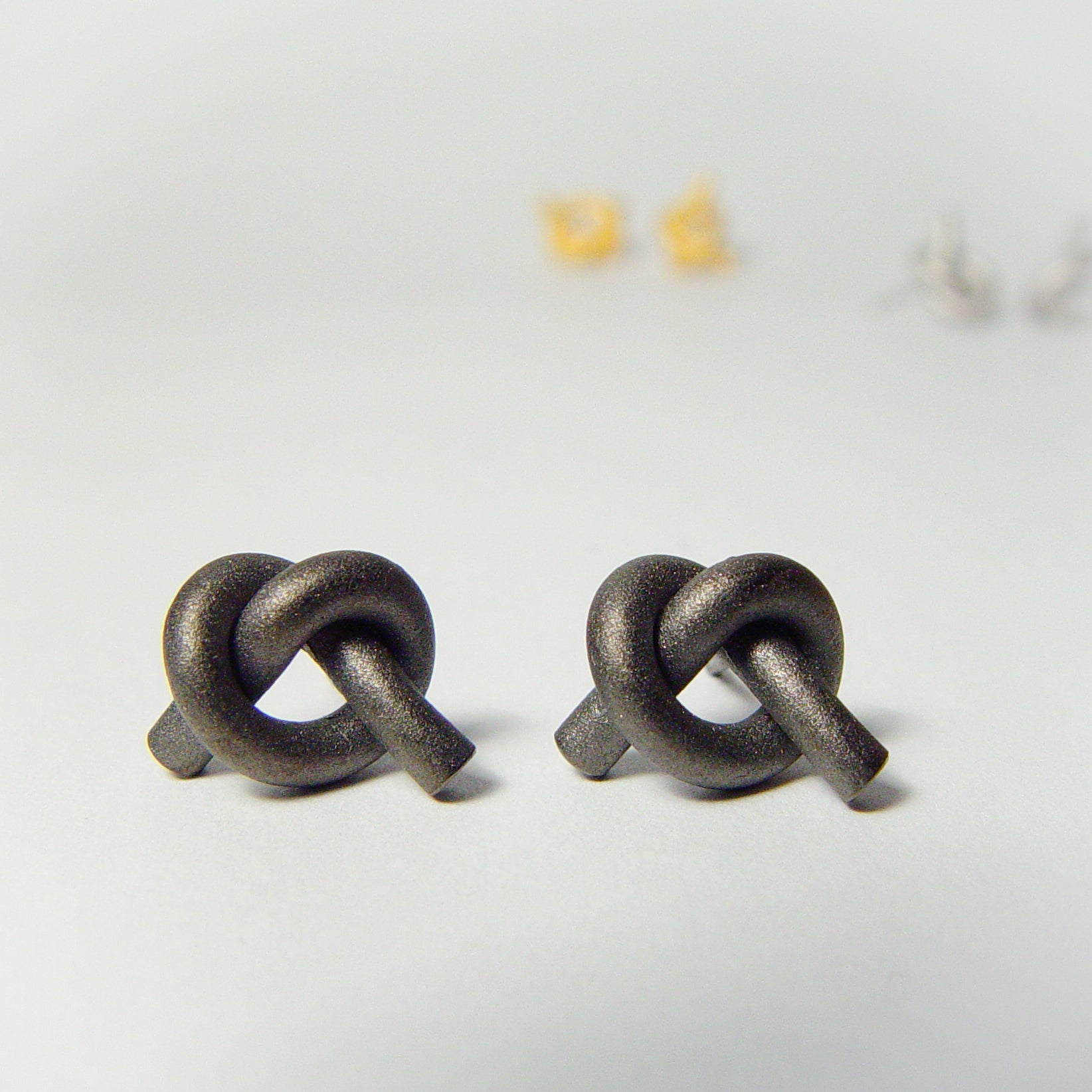 Ohr Knoten rund klein